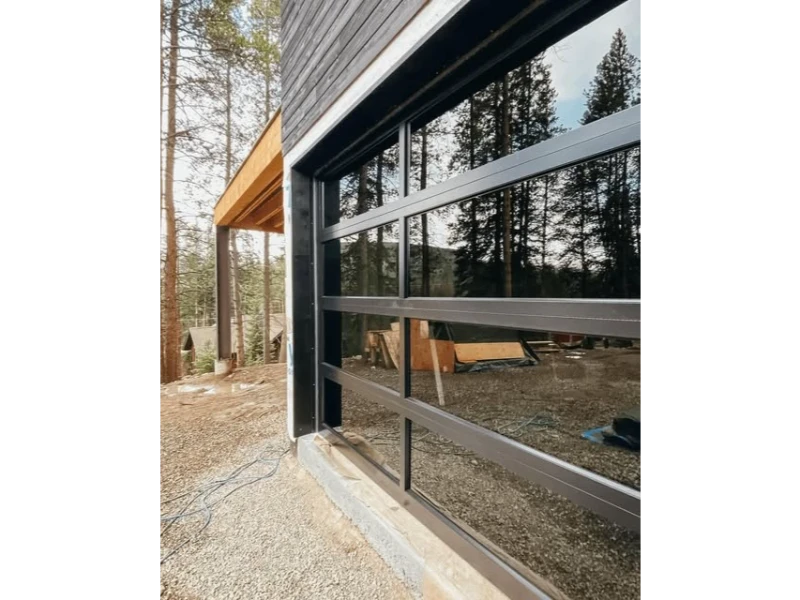 Emergency Garage Door Repair in Alvin, TX – side view of full-view glass garage door with black frame