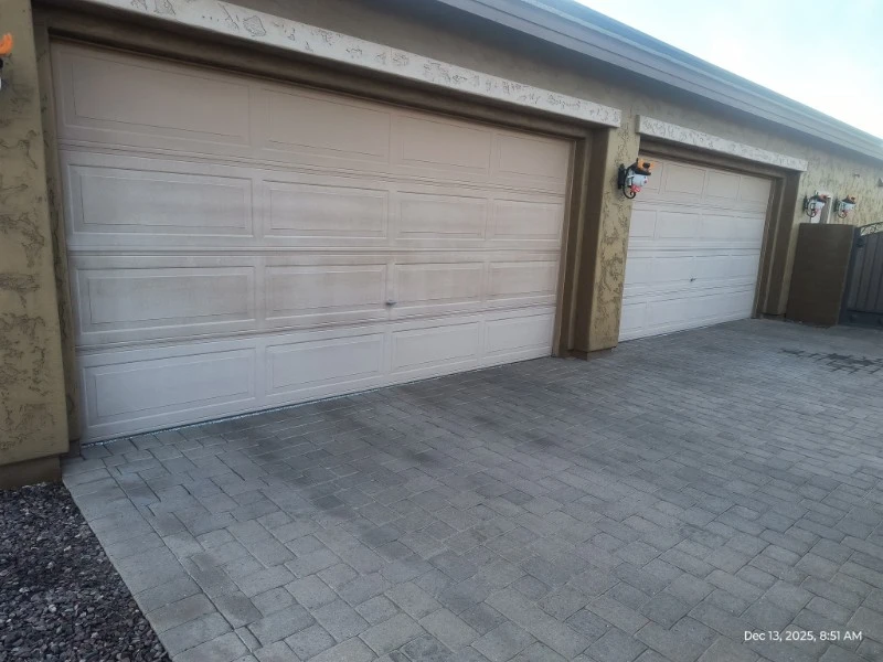 Emergency Garage Door Repair in Alvin, TX – white raised-panel double garage doors with driveway