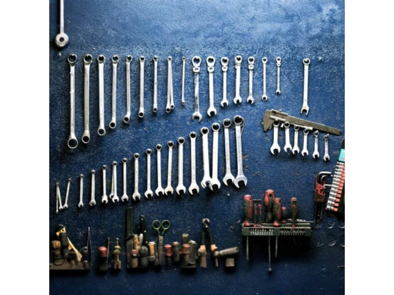 Garage Door Hardware Repair & Tune-up Services in Alvin, TX – sectional garage door tune-up with tracks, rollers, and hardware checked.