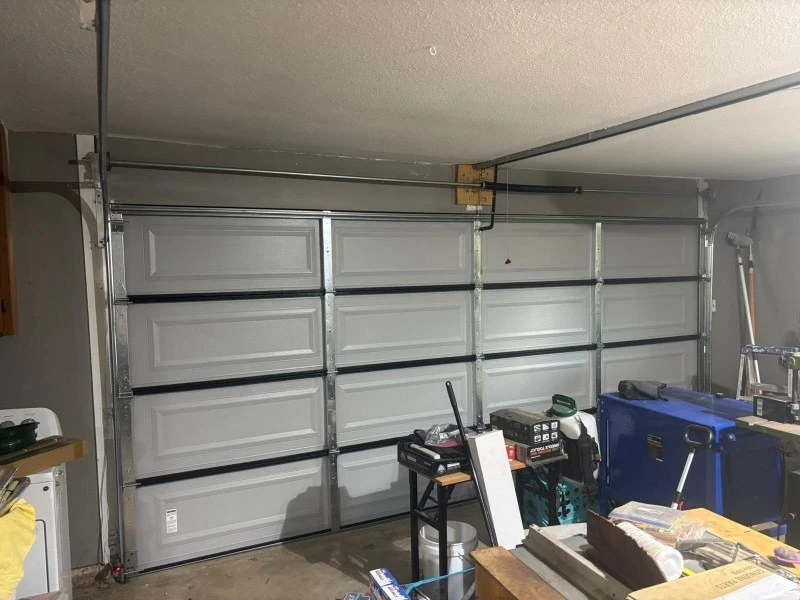 Garage door after annual maintenance—clean, aligned, and running smoothly in Alvin, TX.