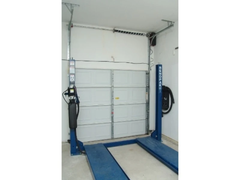 Off-Track Garage Door Repair in Alvin, TX – garage door collapsed and stuck off track.