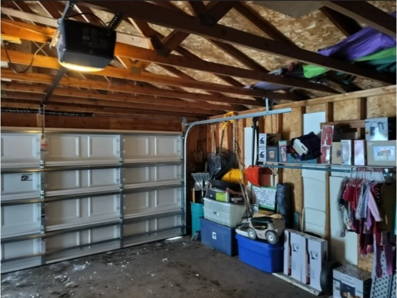 Best & Reliable Garage Door repair services in Alvin, TX – Technician setup and workshop tools for garage door installation.
