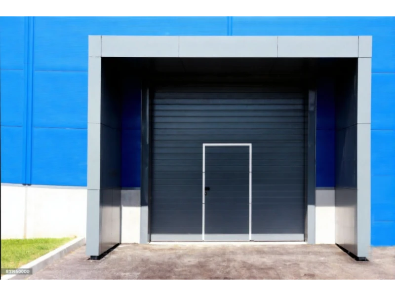 Commercial rolling steel door repair Alvin, TX – blue building roll-up door
