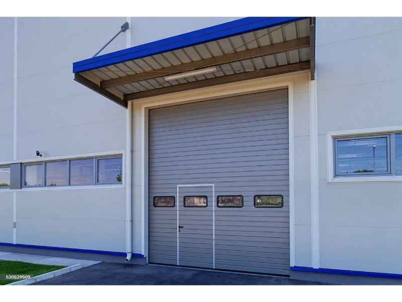 Exterior rolling steel door repair Alvin, TX – roll-up door with access door