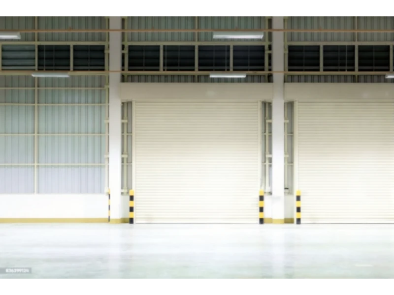 Rolling steel door maintenance Alvin, TX – indoor door in industrial hall