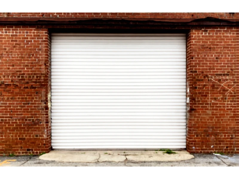 Rolling Steelroll-up Door Repair Alvin, TX - brick building white roll up